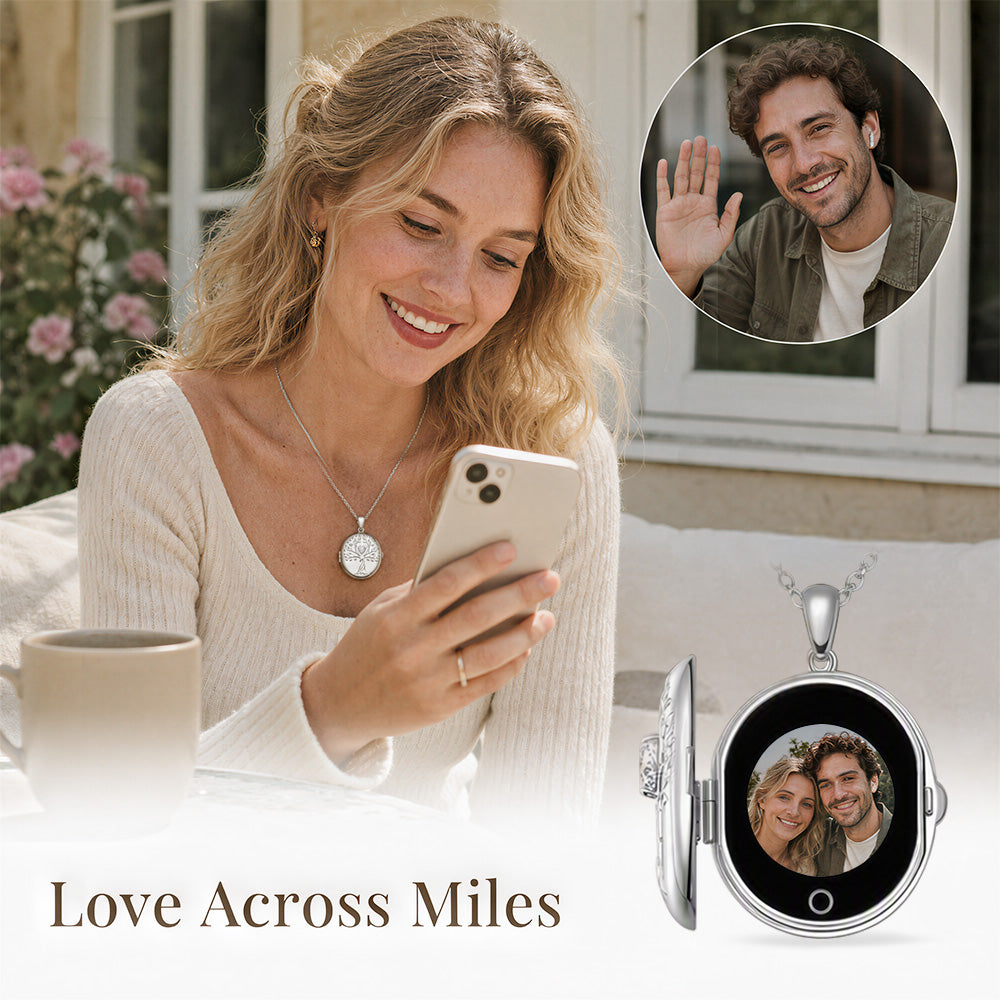 A woman in a cream ribbed sweater looks at her phone, wearing a silver custom photo locket necklace The image includes a close-up inset of a waving man and a product shot of a silver locket-style pendant on a chain with a photo displayed inside.