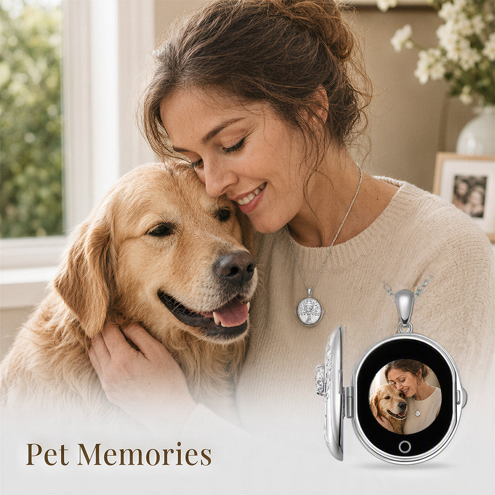 A woman hugging a golden retriever dog in a bright indoor setting, wearing a silver necklace with digital locket necklace. In the lower right, an open silver locket-style pendant displays a photo of the woman and dog, with the text 'Pet Memories' below.