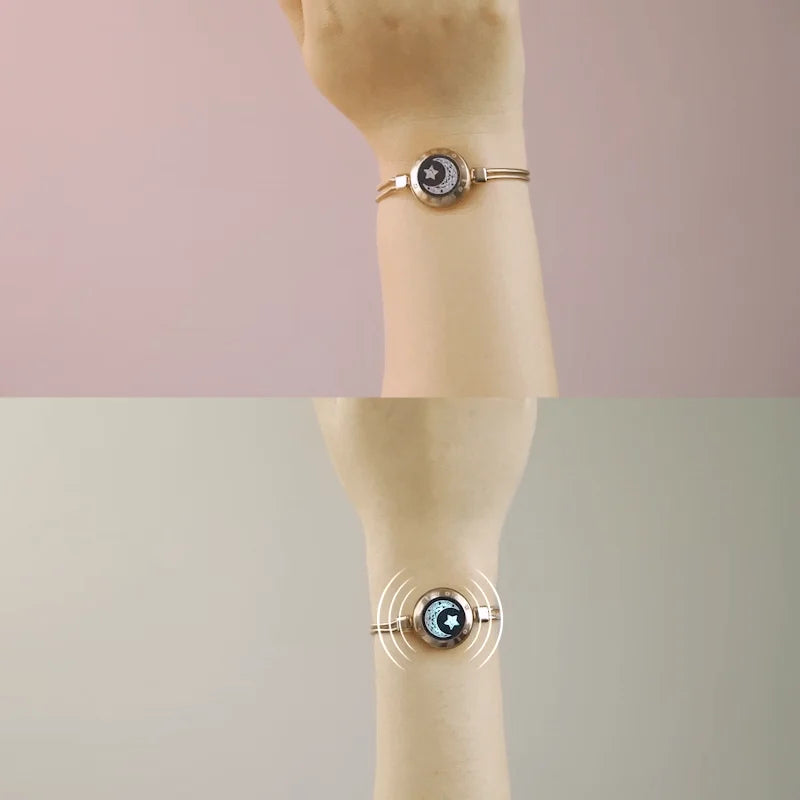 Moon and Moon bracelets demonstrating sending and receiving a touch