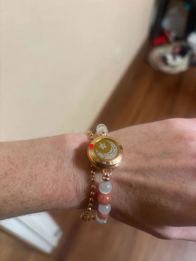 Reviewer wearing a Moon bracelet with pink and white beads